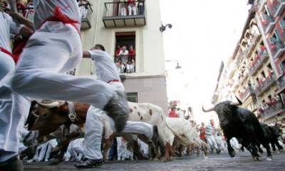 The long held tradition of Running of the Bulls in Spain is now coming to the US with The Great Bull Run. Photo credit: Susana Vera/Reuters