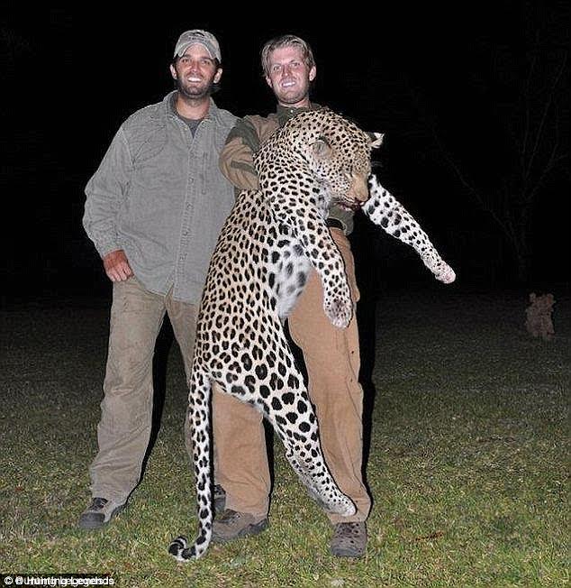 Donald Trump Jr., left, with his brother, Eric, carrying their trophy kill. Photo Credit: